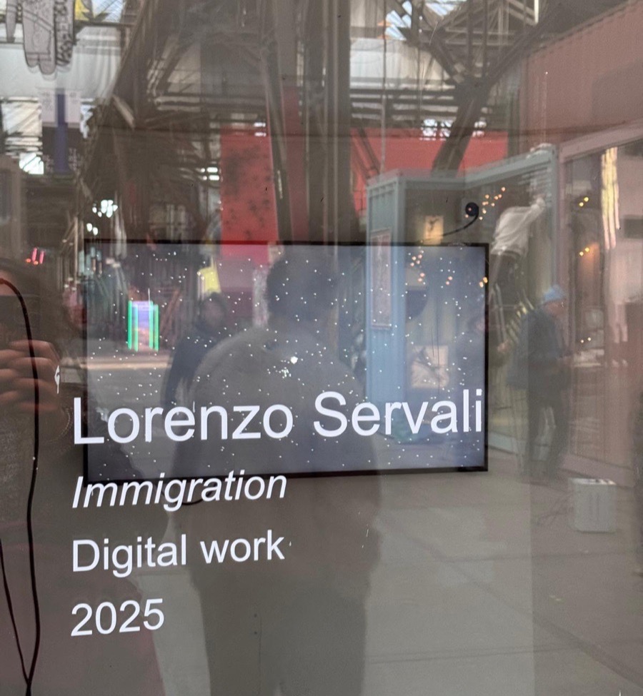 Installation view at NDSM Fuse, the work shown on a screen behind glass