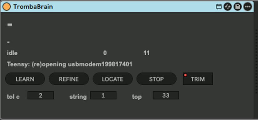 Screenshot of the TrombaBrain device in Ableton Live: a small dark panel with a status screen, the buttons LEARN, REFINE, LOCATE, STOP and TRIM, and number boxes for tolerance, string and top note